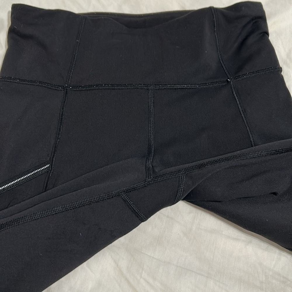 Lululemon black leggings. Size 4 with pockets. - Picture 5 of 11